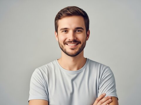 Confident young man smiling at camera
