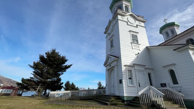 Low angle tracking shot showcasing a historic church in Dutch Harbor, Alaska.