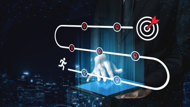Business professional interacts with digital interface, showcasing a strategic path to success and achievement in a modern technology-driven environment, emphasizing innovation and progress. Ledger