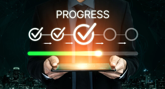 Businessman Holding Tablet Displaying Progress Indicators and Checkmarks for Online Project Management and Goal Achievement in Modern Digital Environment. Bitwise.
