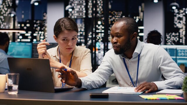 Diverse business professionals collaborate in office