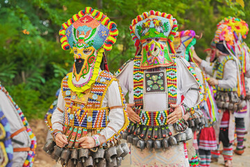 Kukeri Group. Masked performers in traditional festival costumes. Several Bulgarian masked performers in richly decorated costumes. Vibrant folklore carnival, ritual cultural heritage celebration © svetlanais