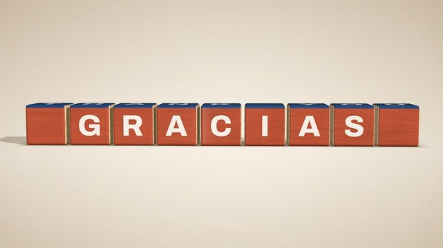 Multilingual thank you text on rotating toy letter blocks, seamless loop of gracias, merci and danke