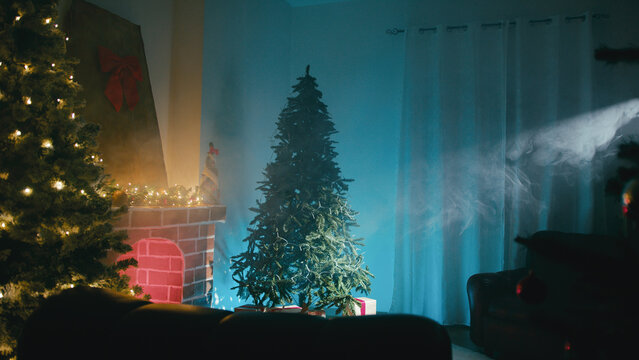 Beam of Light and Unlit Christmas Tree in a Room