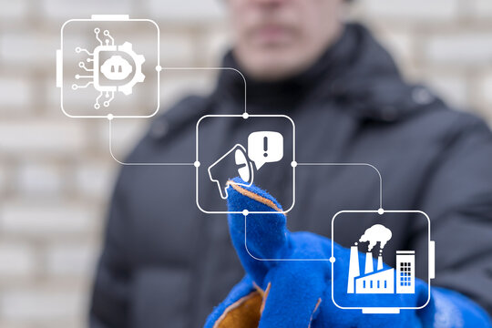 Concept of industry advertising. Engineer using virtual touchscreen presses the icon of megaphone.