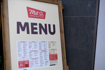 Obraz premium board with signage and menu at Mill Street Brewpub Distillery District Toronto (21 Tank House Lane)