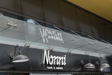 Obraz premium exterior building facade and sign of Nonni Cafe & Bakery located at 430 King St W, Toronto