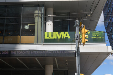 Obraz premium exterior building and sign of Luma, a restaurant, located at 350 King St W, Toronto