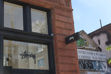 Obraz premium exterior building facade and signage at Stüssy, a clothing store, located at 241 Spadina Av, Toronto
