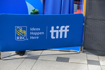 Obraz premium barrier cover featuring logo and slogan of RBC, a major partner of TIFF, Toronto International Film Festival, at David Pecaut Square