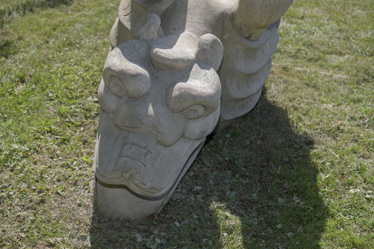 "gargoyle" from Monsters for Beauty, Permanence and Individuality by Duane Linklater located in the Lower Don Trail, at a meadow just north of the Prince Edward Viaduct, Toronto