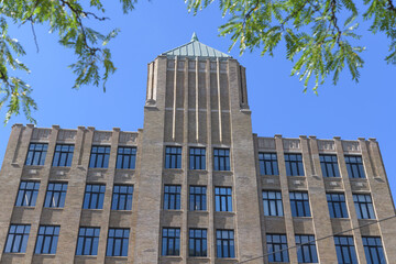 Obraz premium roofline and pyramidal tower at Tower Building designed by Benjamin Brown in Art Deco style located at 110 Spadina Av Garment District, Toronto