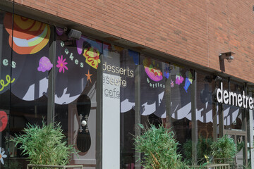 Obraz premium exterior building facade and signage at Demetres Desserts Distillery District, a dessert restaurant, located at 28 Gristmill Lane, Toronto