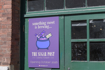 Obraz premium door signage outside The Sugar Post, a new candy store at the Distillery District, Toronto