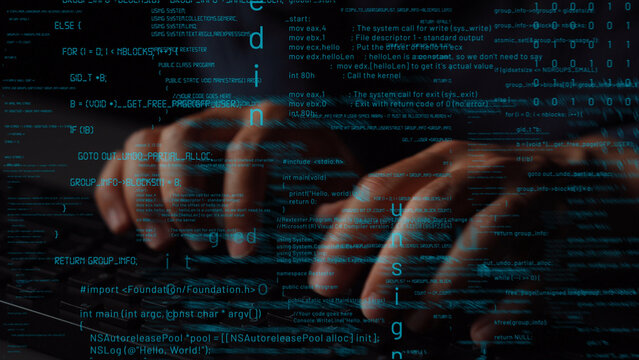 Close-up of hands typing on a keyboard with glowing code in the background, representing the essence of programming and digital creativity in the tech world. Xenic