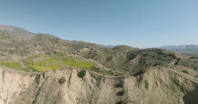 Aerial View of Cultivated Rows on Dry Hillside