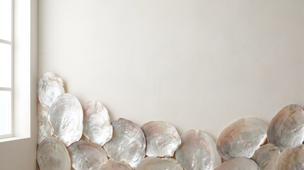 Obraz premium Organic Mother of Pearl Oyster Shell Border on Minimalist Warm White Plaster Wall