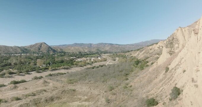 Aerial View of Eroded Cliff and Dry River Channel