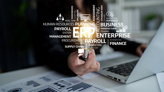 A business professional interacts with ERP software, focusing on interactive data and keywords related to enterprise resource planning, enhancing efficiency and decision-making. Tessel
