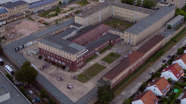 Berlin Hohenschoenhausen Memorial, a former Stasi prison, representing political persecution and communist dictatorship. Unique aerial view drone camera pointing down