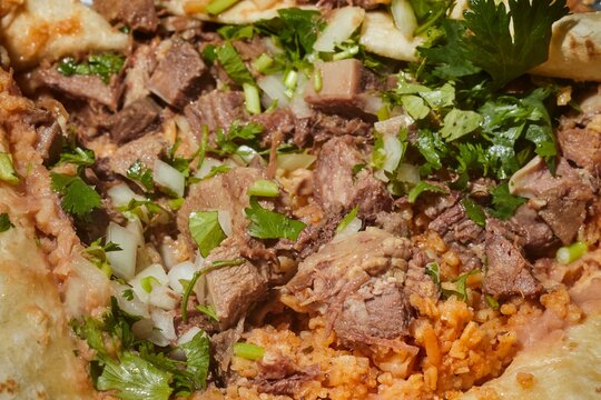 Beef tongue burrito opened to show the filling