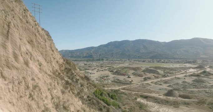 aerial view of vast badlands valley with eroded formations