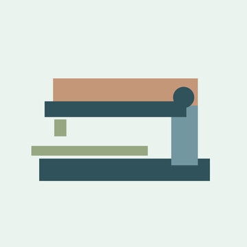 Teal and tan open stapler with a sheet beneath the arm
