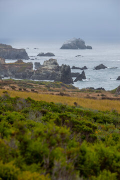Rugged Cliffs and Sea Stacks Along the Pacific Coastline in Big Sur California