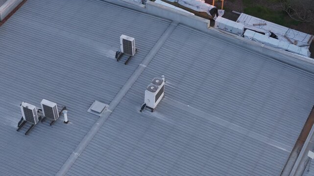 Air conditioning units installed on a metal rooftop