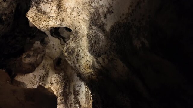 Close up of textured cave walls with natural formations.