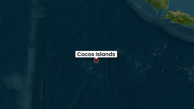 Cocos Islands location marker on digital world map video footage