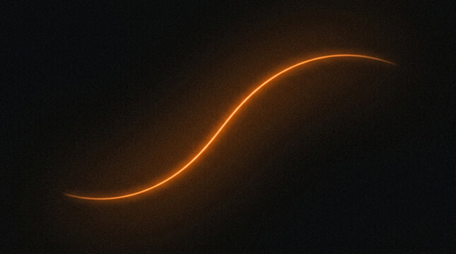 Abstract glowing orange sshaped light trail on a dark background