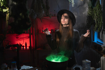 Calm and zen. realistic witch brewing a potion in cauldron meditating in yoga pose. Blend of everyday life with traditional witchcraft, magic and mystical atmosphere © Andrii Lysenko