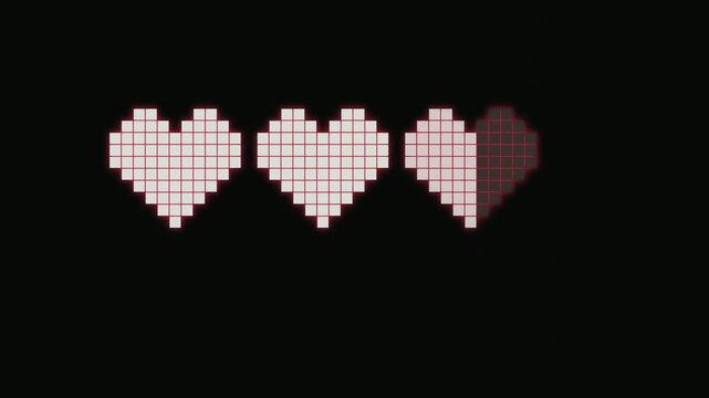 Motion graphics footage of retro 8-bit pixel hearts representing game health bar on black screen.