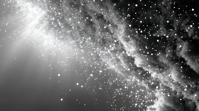 Black and white abstract with light bursts, nebulous shapes, and sparkling particles