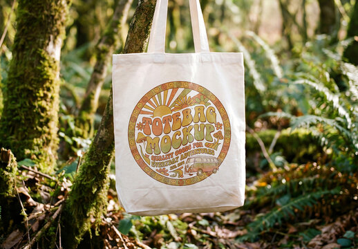 Tote Bag Hanging on a Tree in a Forest Mockup
