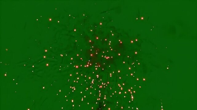 Realistic firework exploding with golden sparks raining down. Abstract glitter particles create a celebratory effect on a green screen