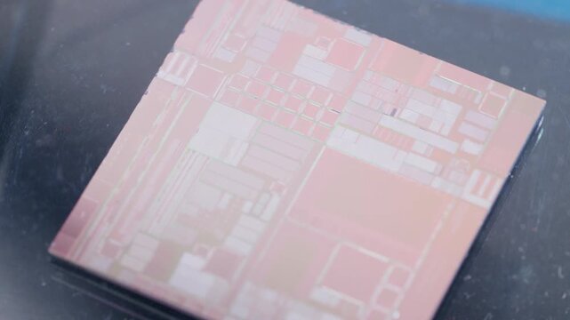 CPU computer microprocessor chip showing golden pins and capacitors on a blue background as a conceptual backdrop for artificial intelligence hardware semiconductor innovation cloud computing and info
