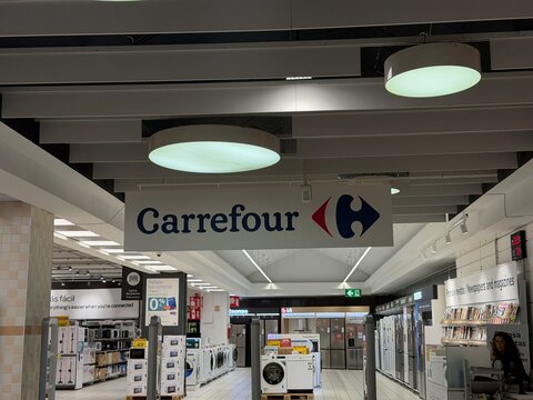 Mallorca, spain, septiembre 18, 2026 carrefour brand sign hanging in a modern retail store, featuring home appliances and electronics department