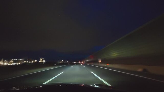 POV night driving on A4 motorway toward Vienna, Austria.