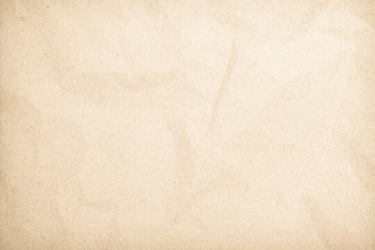 Old paper vintage texture surface for background. Recycle pale brown paper texture, Cream color recycled kraft paper texture blank with copy space for text.	