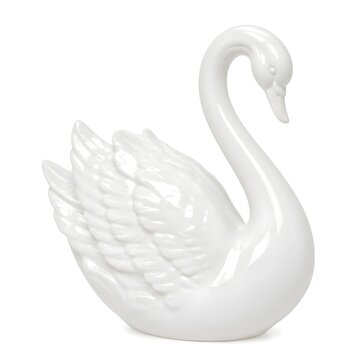 White porcelain swan figurine isolated on a plain white background