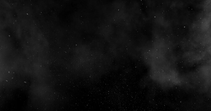 Realistic snowstorm particles and drifting snowflakes isolated on black background. Atmospheric winter weather effect ideal for overlays, visual effects, compositing and cinematic scenes.