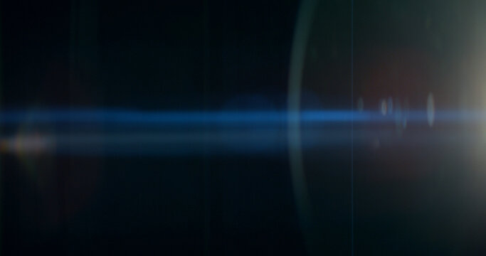 Blue anamorphic lens flare overlay featuring cinematic horizontal light streaks, soft optical reflections and subtle glow on a black background. Premium VFX element for compositing and film editing.