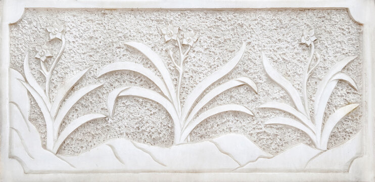 Traditional Chinese  flower floral pattern bas-relief sculpture on white stone wall