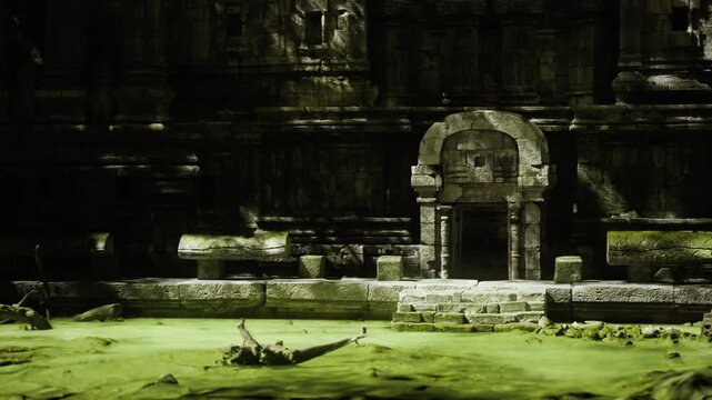 Ancient stone doorway framed by carved lintel and shadowed threshold, close view highlights weathered relief, moss pockets and tactile texture of centuriesold