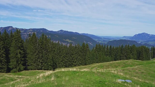 Stunning panorama view of Allgaeu Alps with Gruenten and Nebelhorn massif from Alpe Schrattenwang on Sollereck on sunny summer day, Oberstdorf, Bavaria, Germany