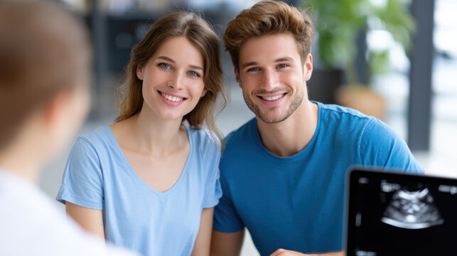 Expectant couple discussing ultrasound consultation with doctor during prenatal clinic appointment for maternity care and sonogram review for expecting parents and prenatal education materials
