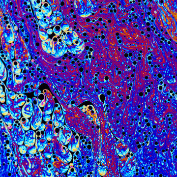 Abstract iridescent soapy surface pattern