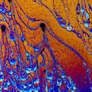 Abstract iridescent soapy surface pattern